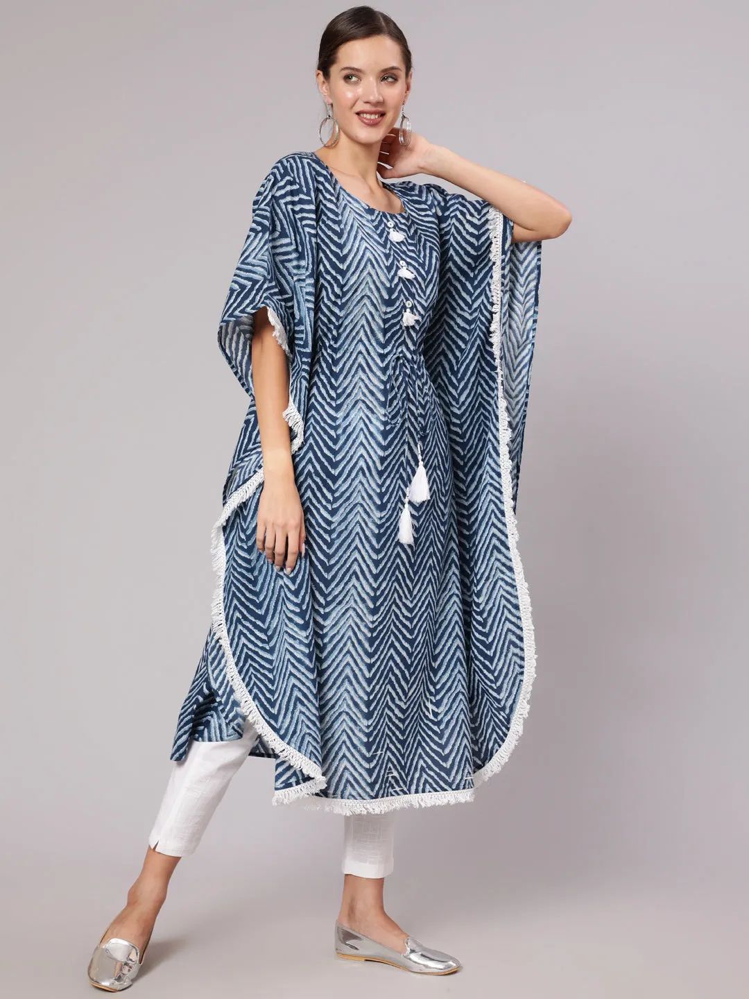 A Blue Color Cotton Pigment Zig-Zag Printed Kaftan With With Laced Embellishments Paired With Solid White Pants