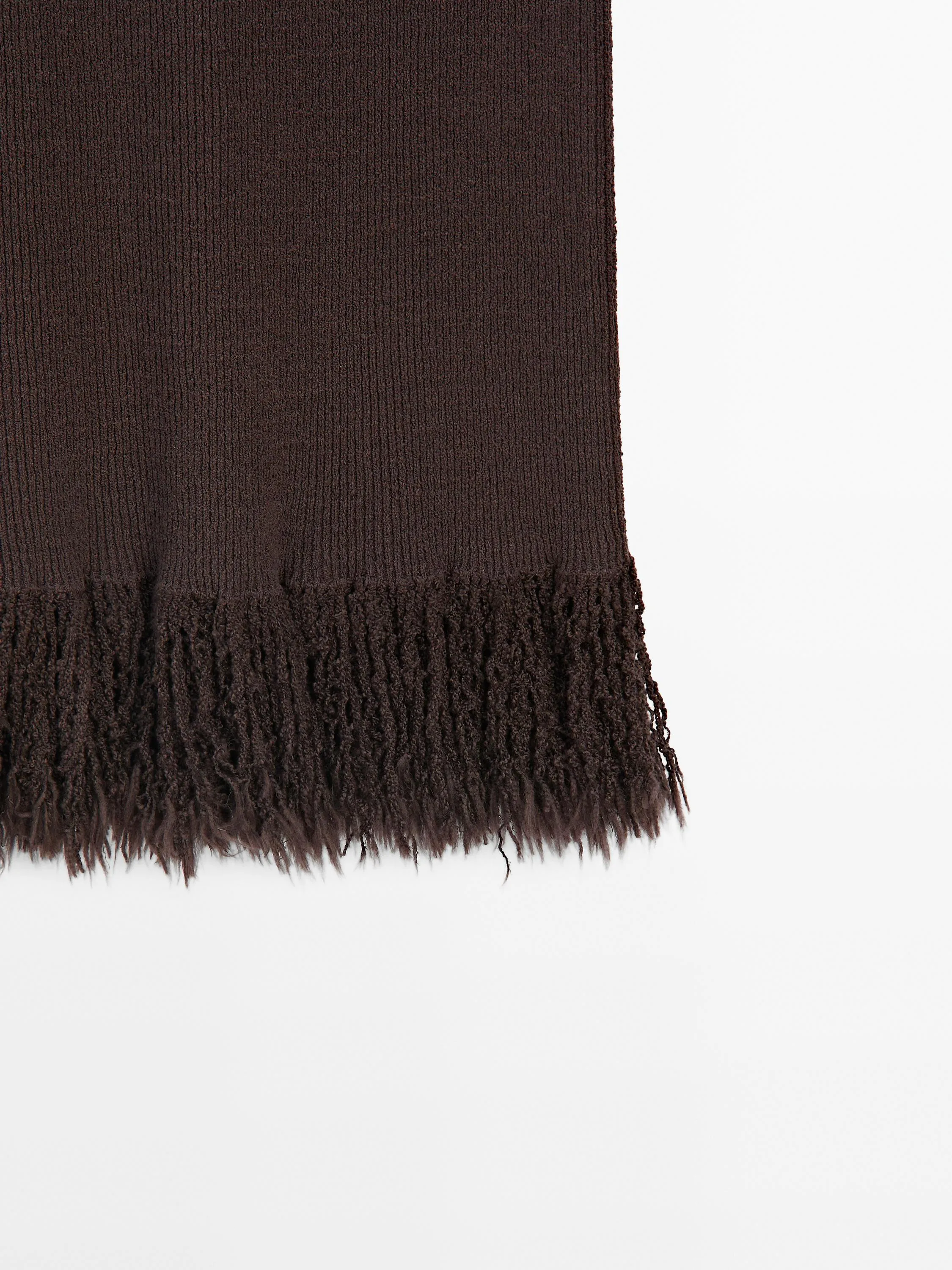 Long knit skirt with fringed hem