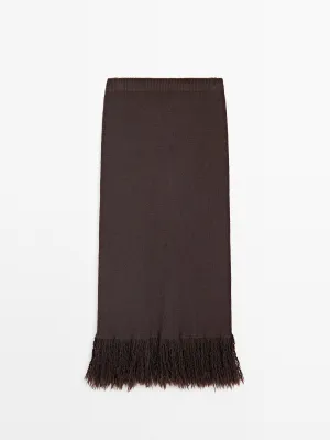 Long knit skirt with fringed hem