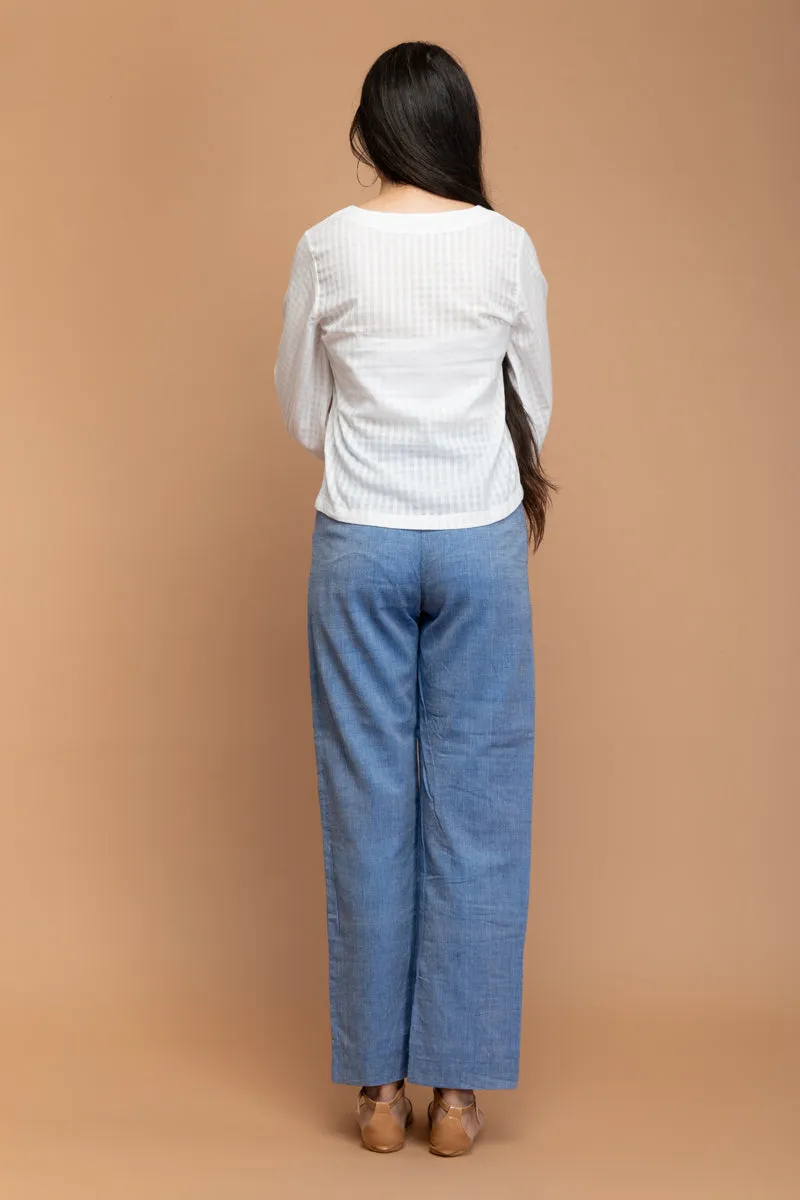 White Top in Textured Cotton with Chambray Blue Pants in Hand Loom Cotton from Sambalpur (Set of 2)