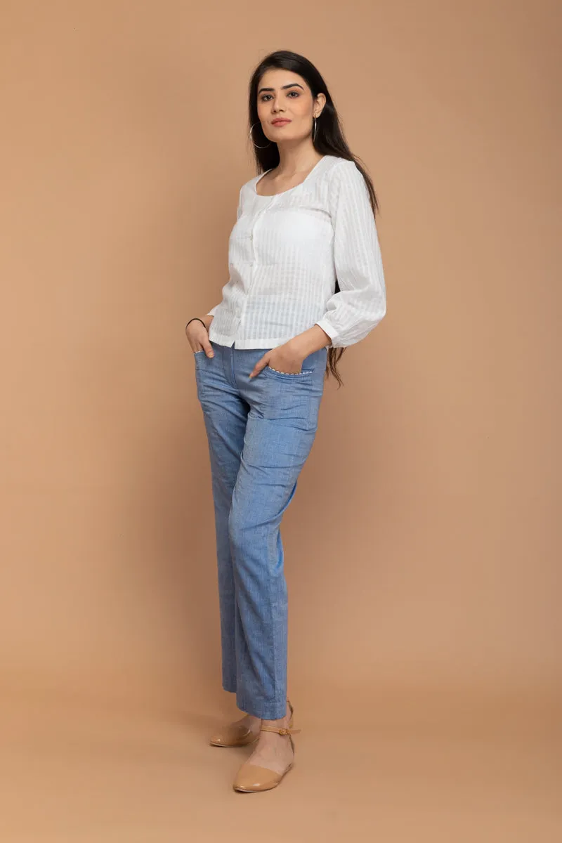 White Top in Textured Cotton with Chambray Blue Pants in Hand Loom Cotton from Sambalpur (Set of 2)